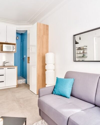 Appartement investissement locatif clé en main, Rue d'Aumale, Paris 9, quartier Nouvelle Athènes, avec cuisine et salon lumineux.