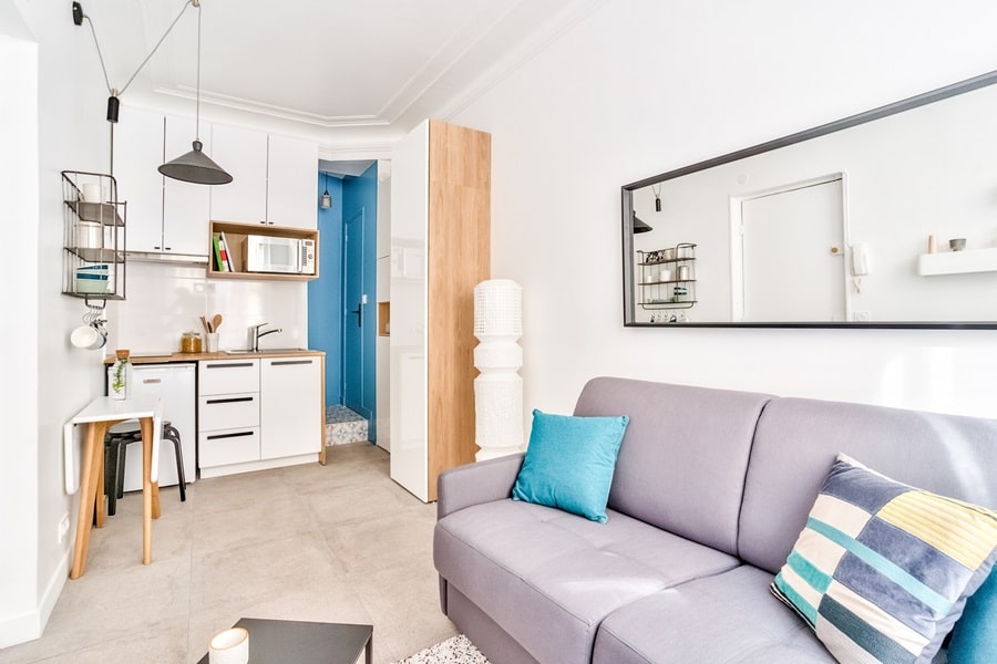 Appartement investissement locatif clé en main, Rue d'Aumale, Paris 9, quartier Nouvelle Athènes, avec cuisine et salon lumineux.
