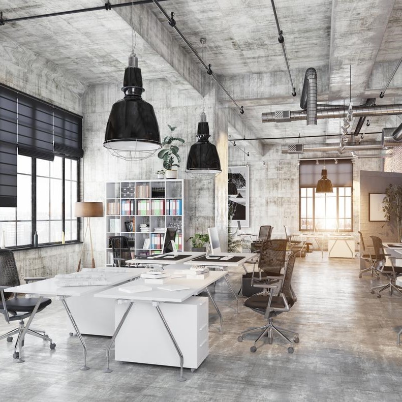 Loft industriel à Paris, idéal pour l'achat de bureaux ou locaux professionnels avec un design moderne.
